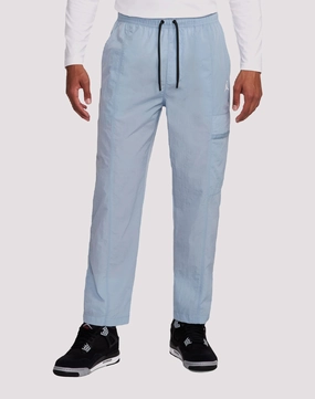 Beaded fashion items Nike Essentials Woven Blue Pants Workwear options