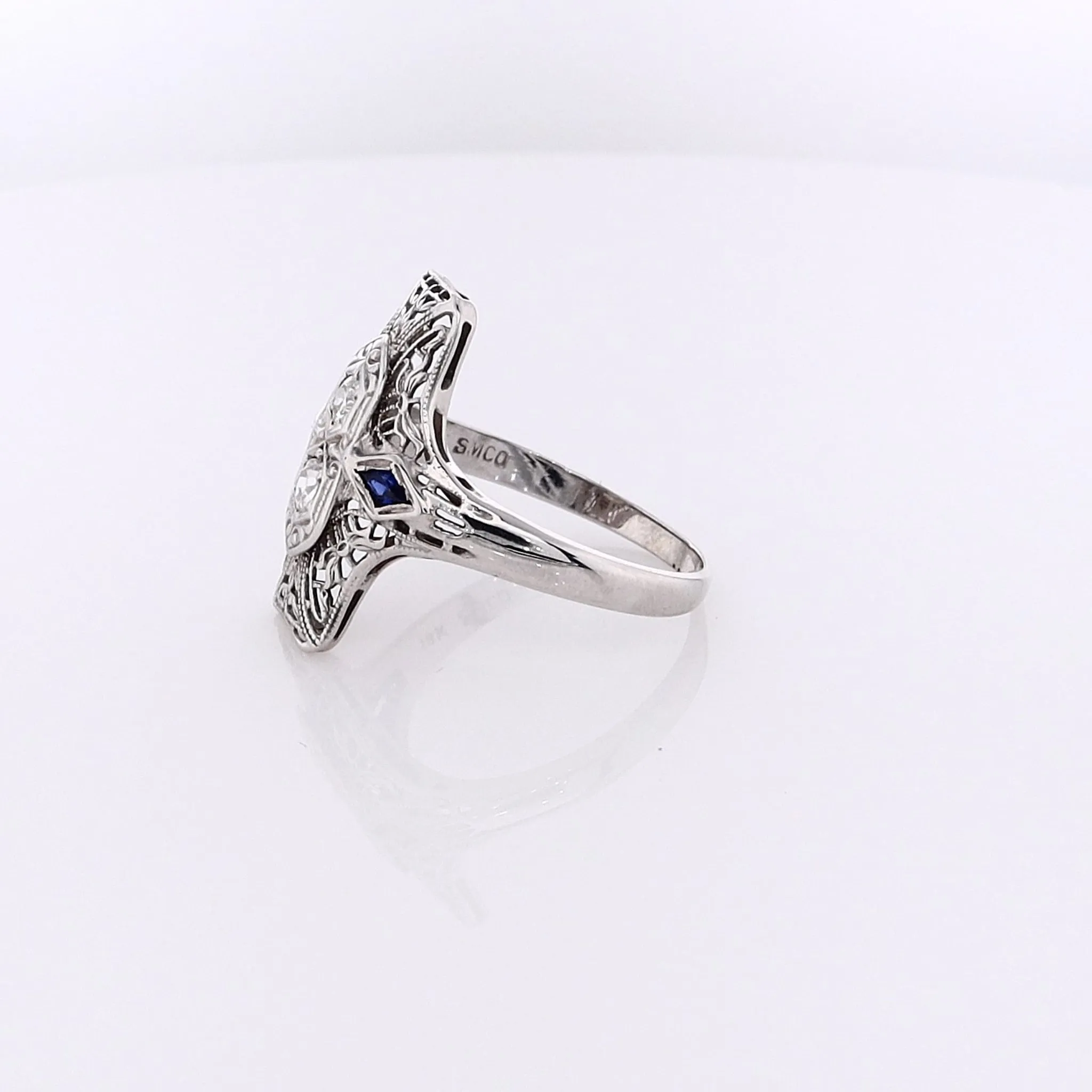 Estate 18 Karat White Gold Filigree Diamond and Sapphire Ring