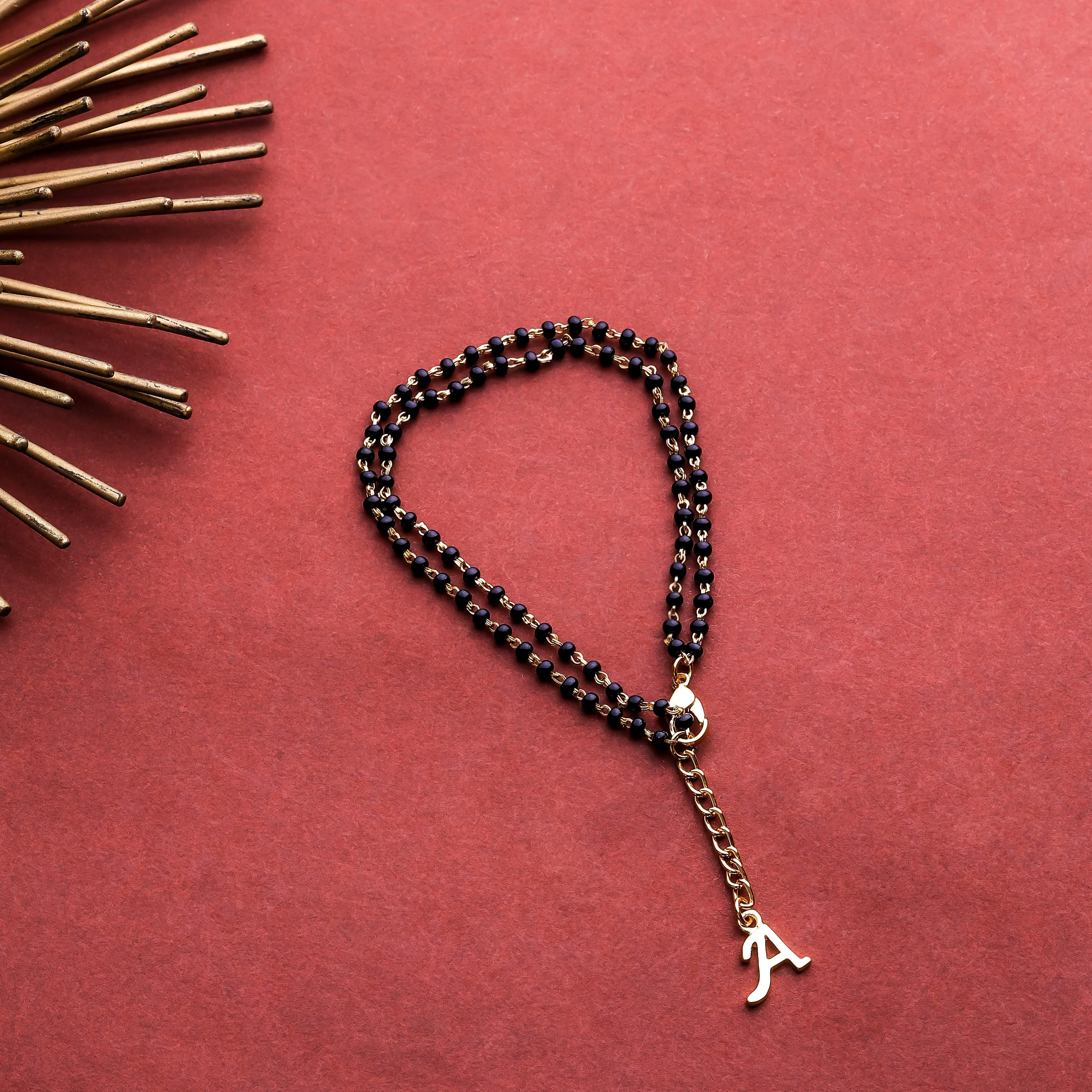 Estele Gold Plated Stylish & Trendy Lightweight "A" Initial Mangalsutra Charm Bracelet with Black Beads for Women