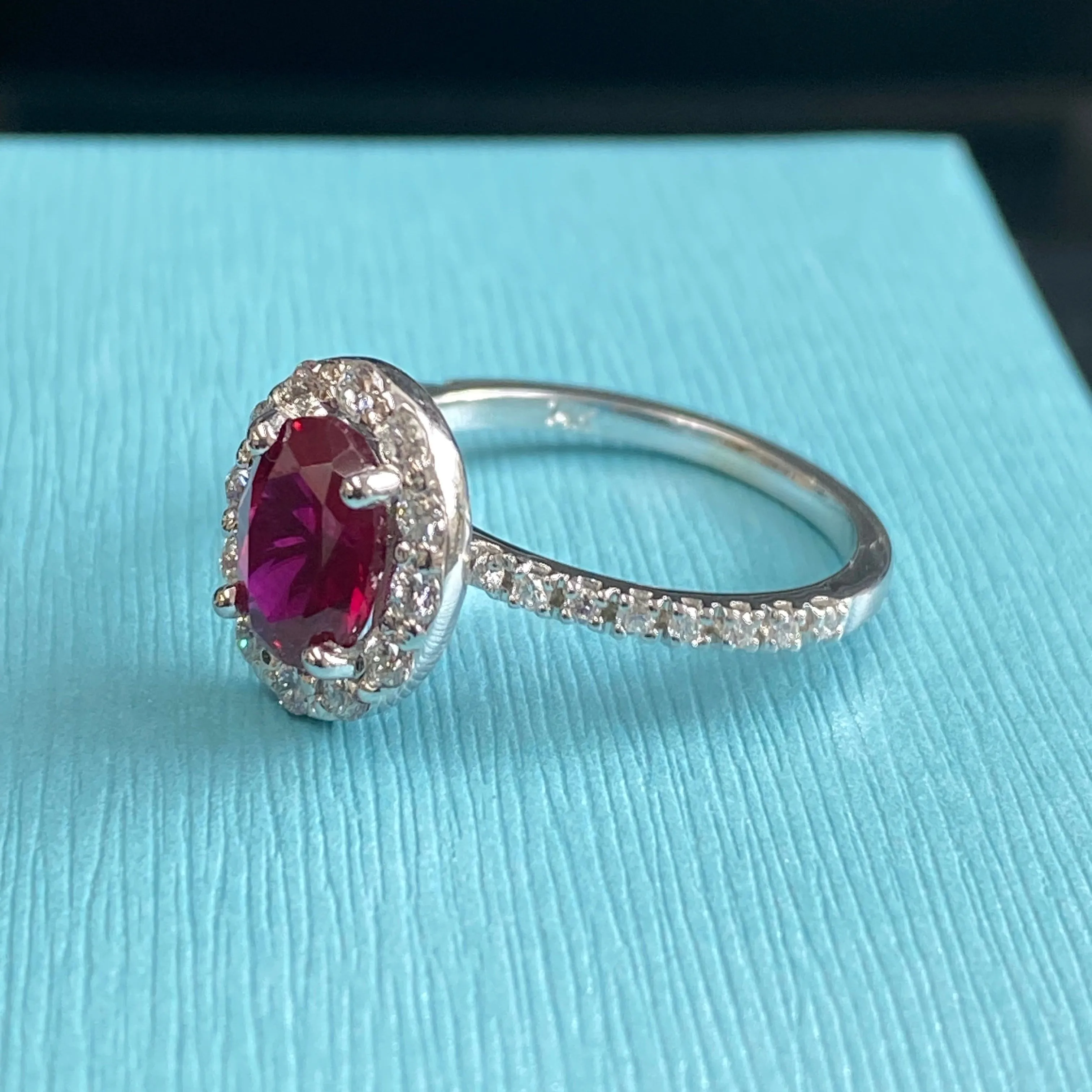 Oval Ruby Diamond Halo Engagement Ring
