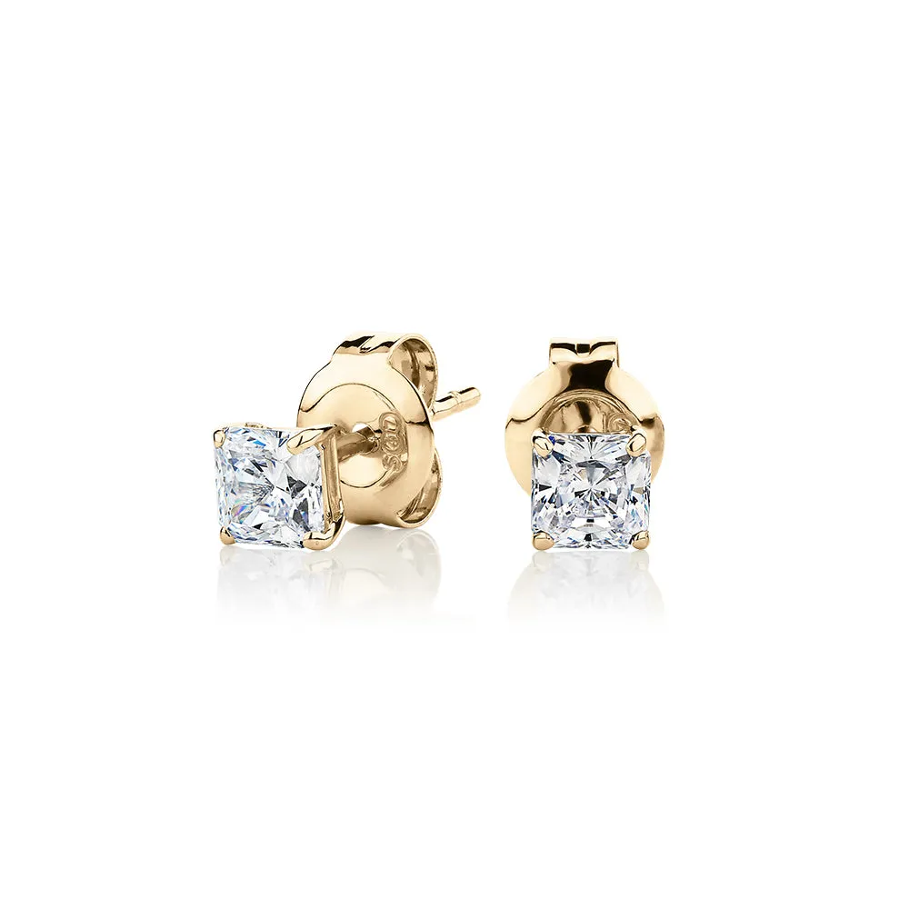 Princess Cut stud earrings with 0.5 carats* of diamond simulants in 10 carat yellow gold