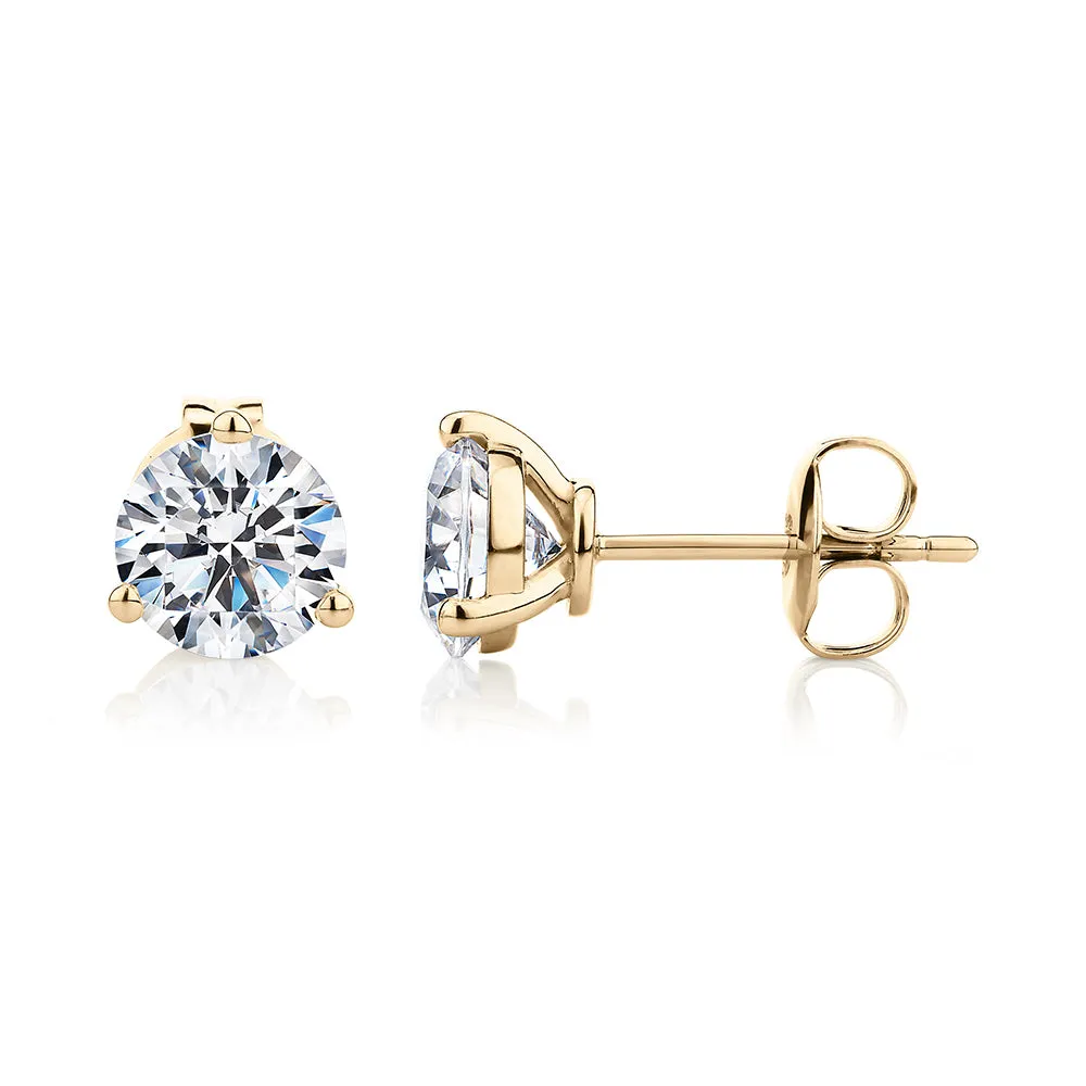 Round Brilliant stud earrings with 2.06 carats* of diamond simulants in 10 carat yellow gold
