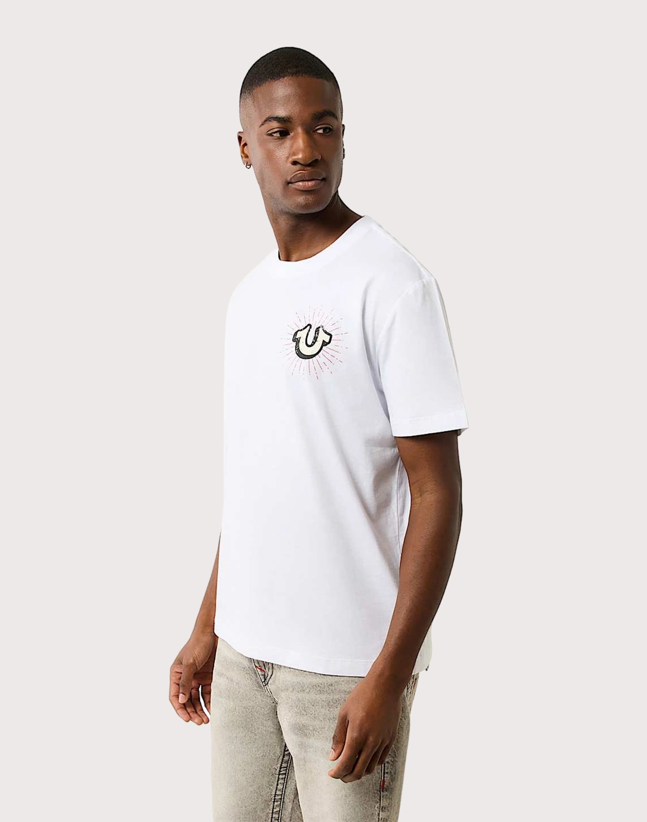 Sustainable fashion practices True Religion Shining Crest Tee Recycled fashion materials