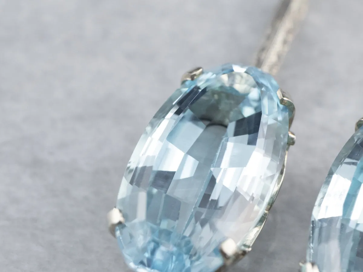 White Gold Blue Topaz Drop Earrings