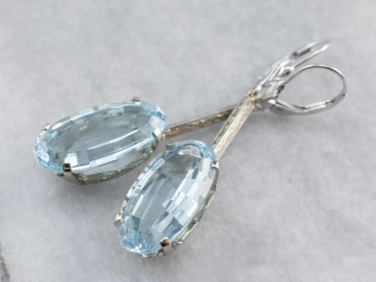 White Gold Blue Topaz Drop Earrings